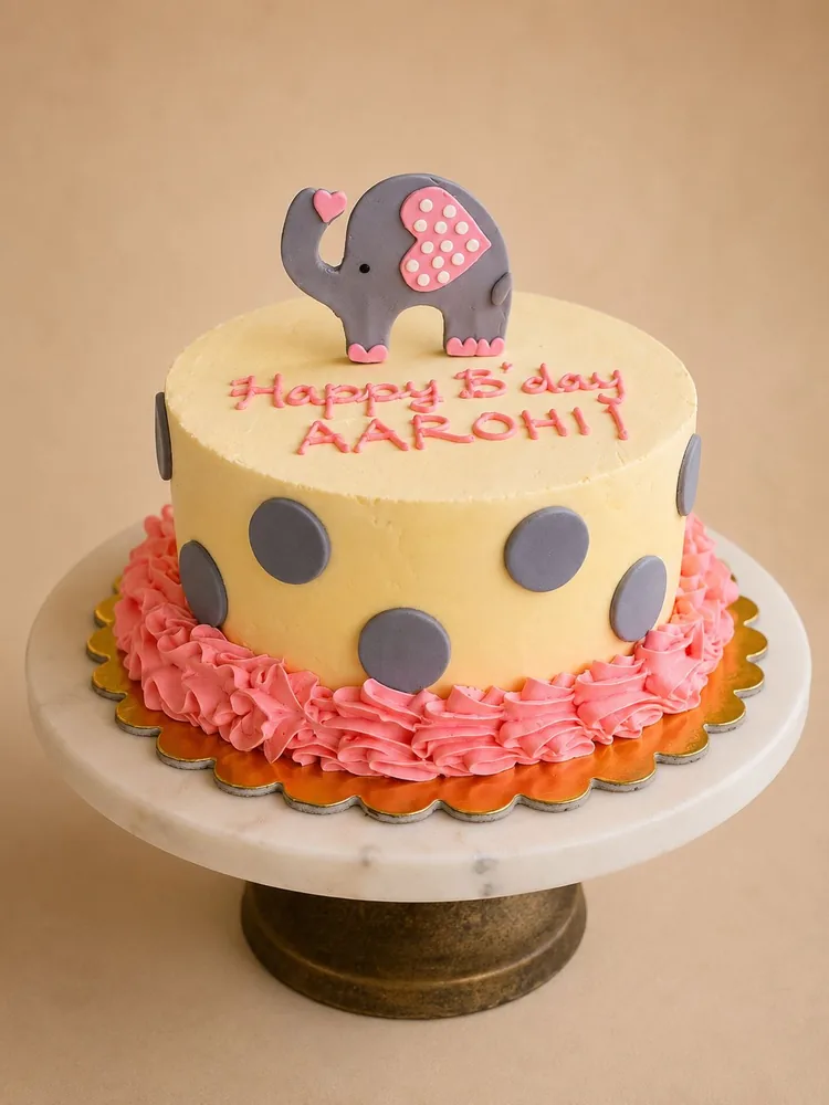 Elephant birthday cake with pink ruffle border