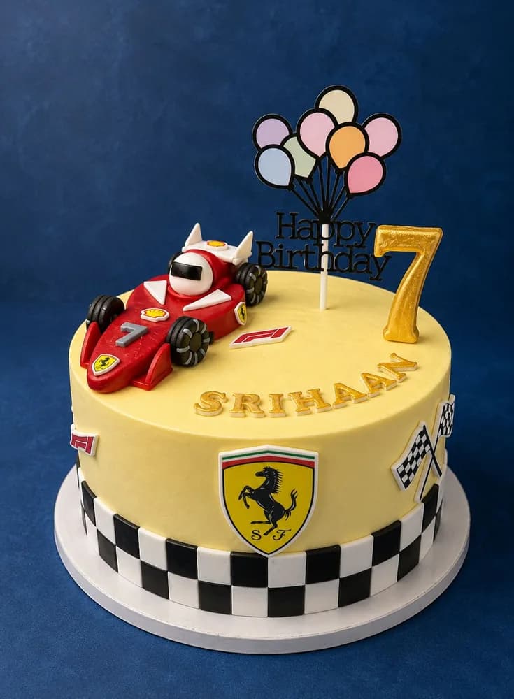 Racing car birthday cake with chequered flag border