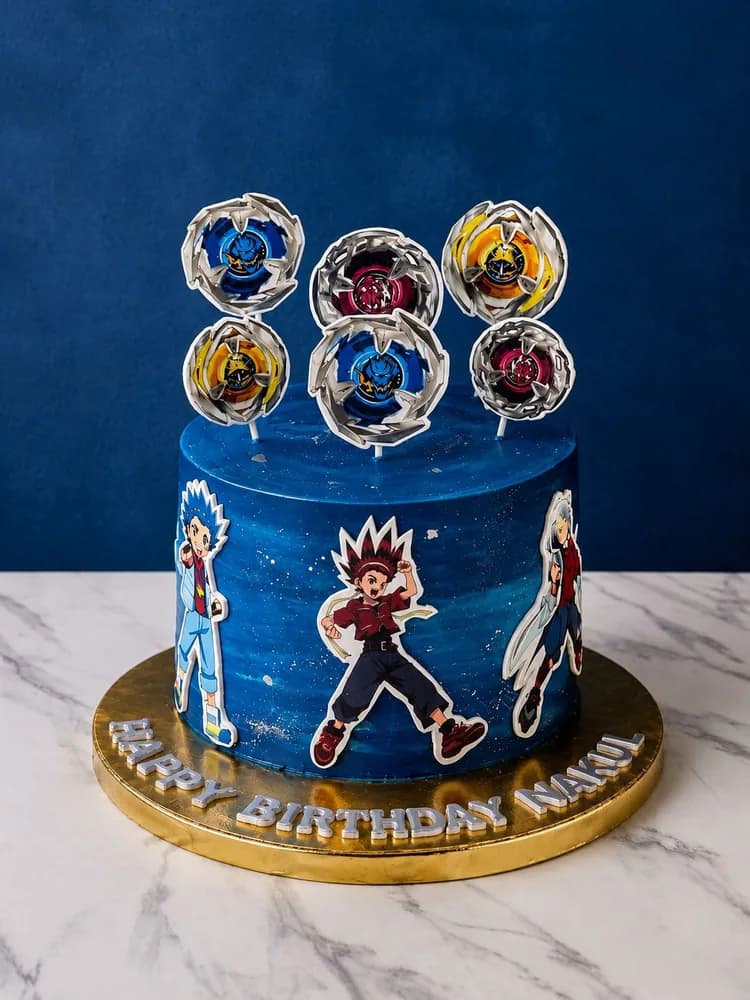 Spinning top battle themed birthday cake