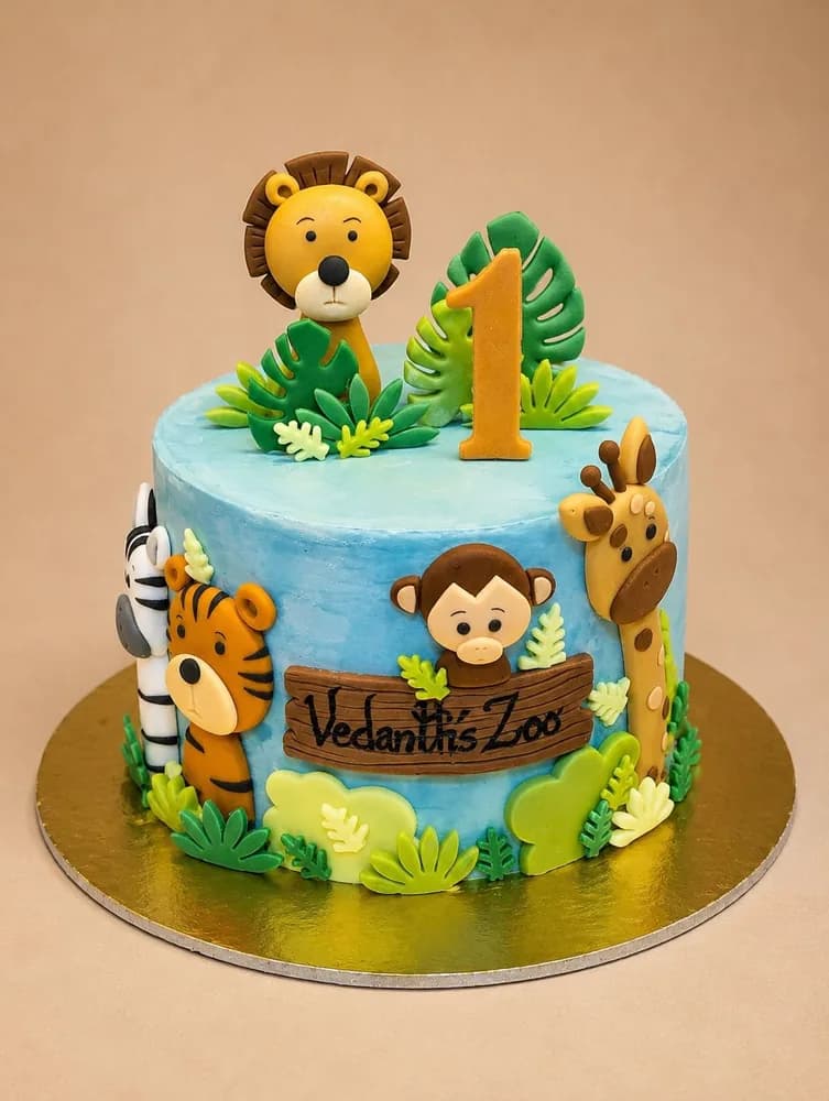 Zoo animals first birthday cake